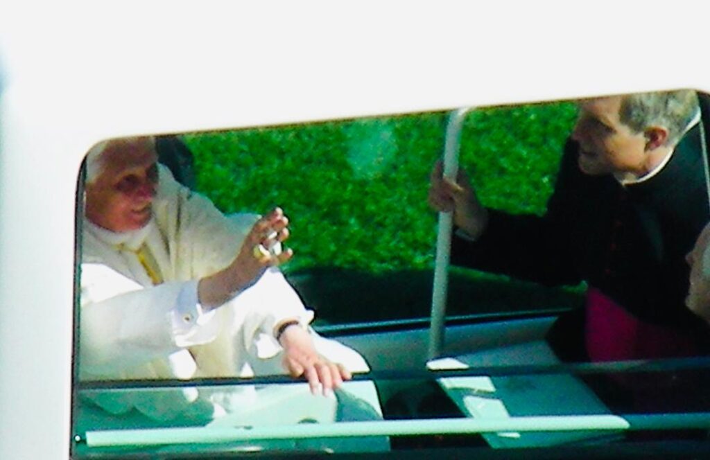 Pope Benedict XVI waving from the popemobile